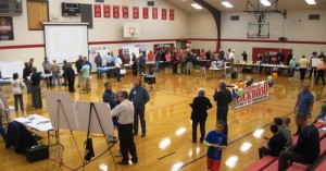 Caption:  A couple hundred residents attended the 2nd Annual Celebrate Lockwood community meeting on Oct. 14, 2014.  Around $3,000 worth of donated items from Lockwood businesses were given away during the annual meeting with the grand prize being a 2000 watt generator donated by Bretz RV & Marine worth $500.  In the photo, district and group representatives visiting with attendees answering questions before the meeting.     